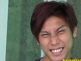Young Asian twinks engage in watersports and rimming