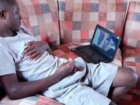Young black men from Africa engage in mutual masturbation